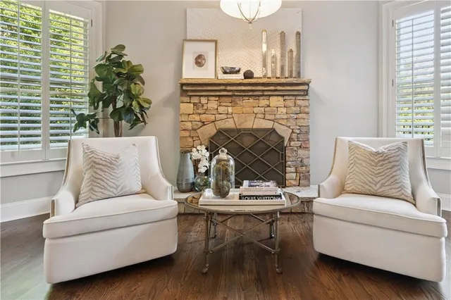 a living room with furniture and a rug