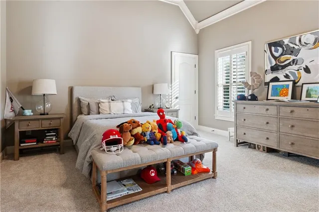 a room with lots of furniture and windows