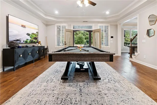 a backyard of a house with table and chairs