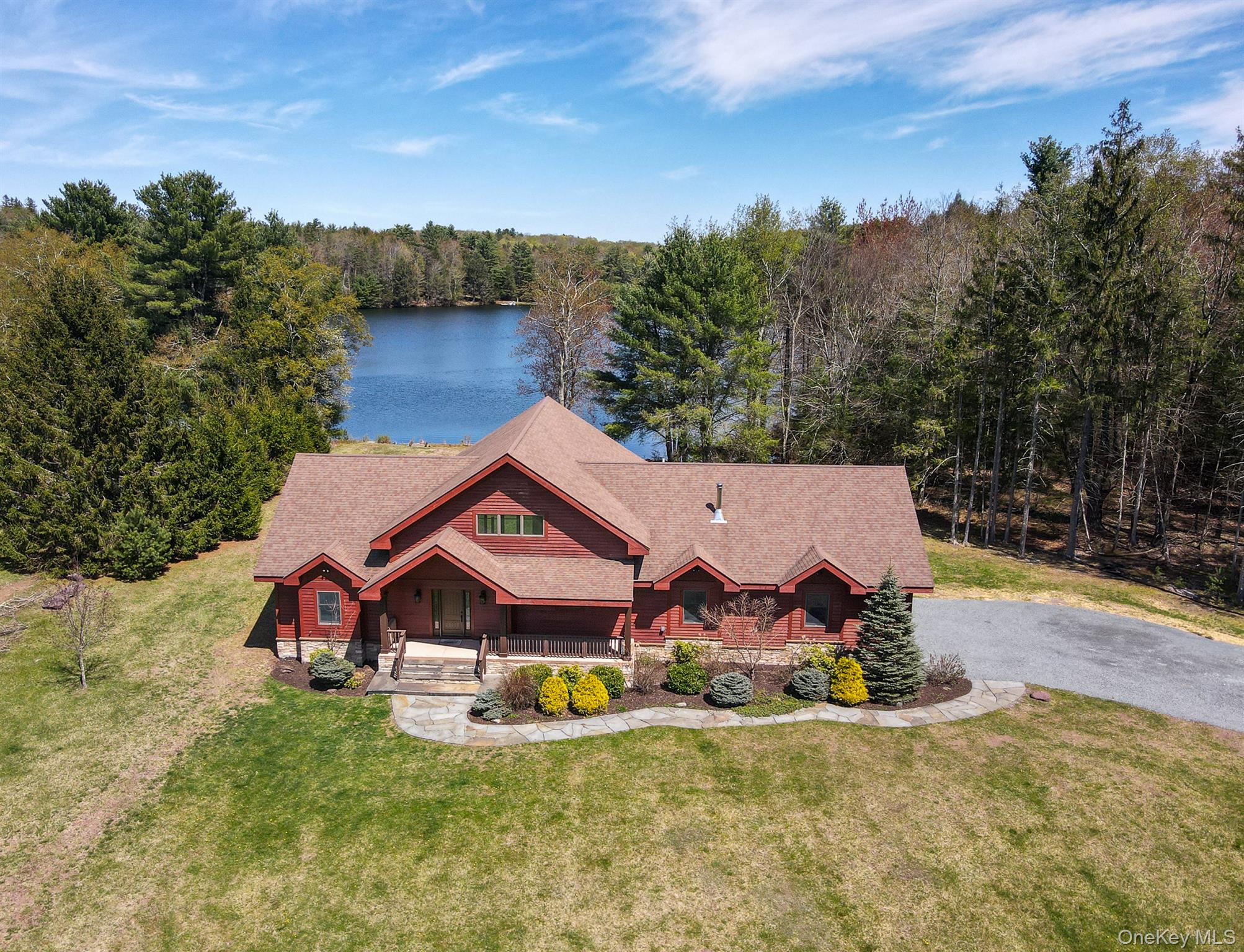 58 Deer Meadow Road Bethel, NY 12786 - Photo 11 of 29 an aerial view of a house with swimming pool and big yard