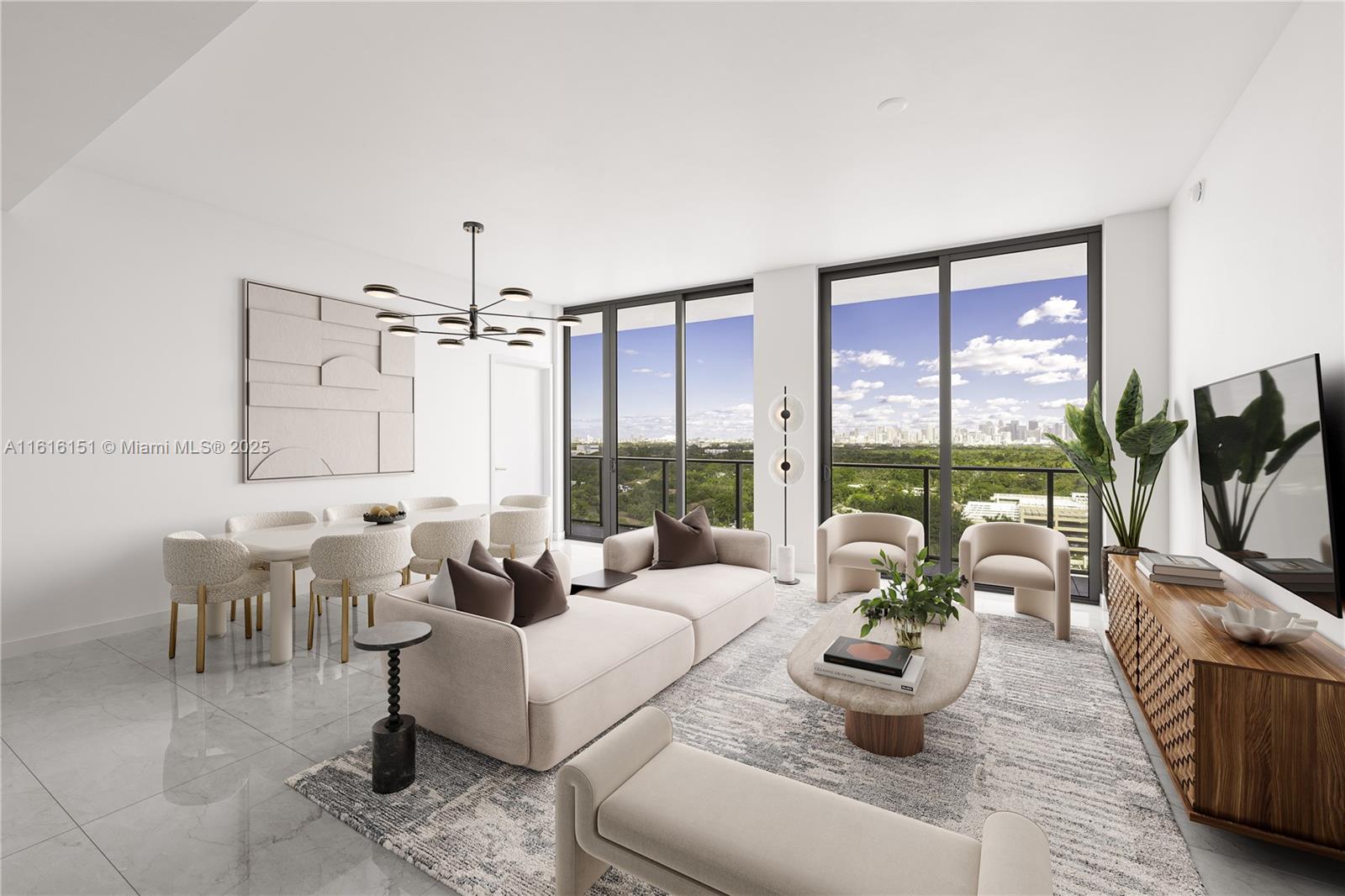 2678 Tigertail Avenue, Unit 1104 Miami, FL 33133 - Photo 2 of 65 a living room with furniture and a large window
