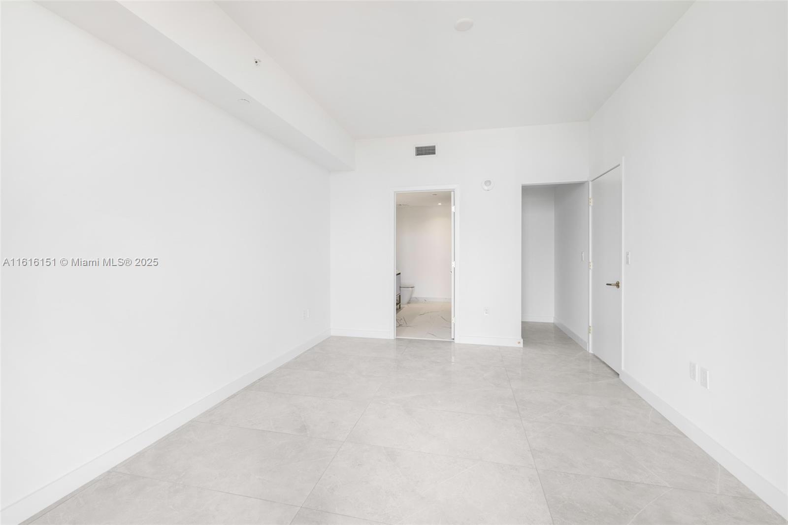 2678 Tigertail Avenue, Unit 1104 Miami, FL 33133 - Photo 27 of 65 a view of an empty room