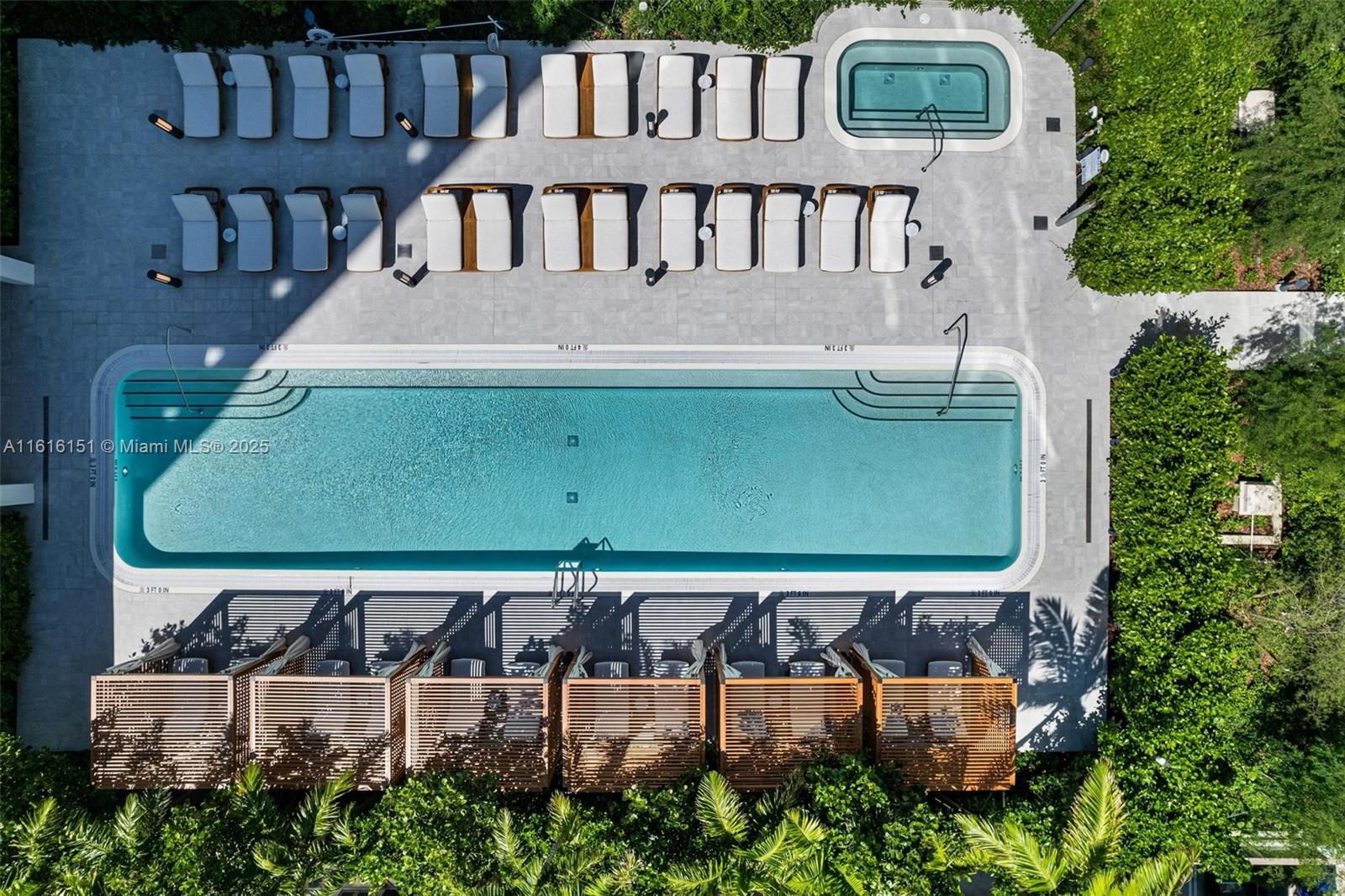 2678 Tigertail Avenue, Unit 1104 Miami, FL 33133 - Photo 44 of 65 a view of a back yard of the house with a chairs