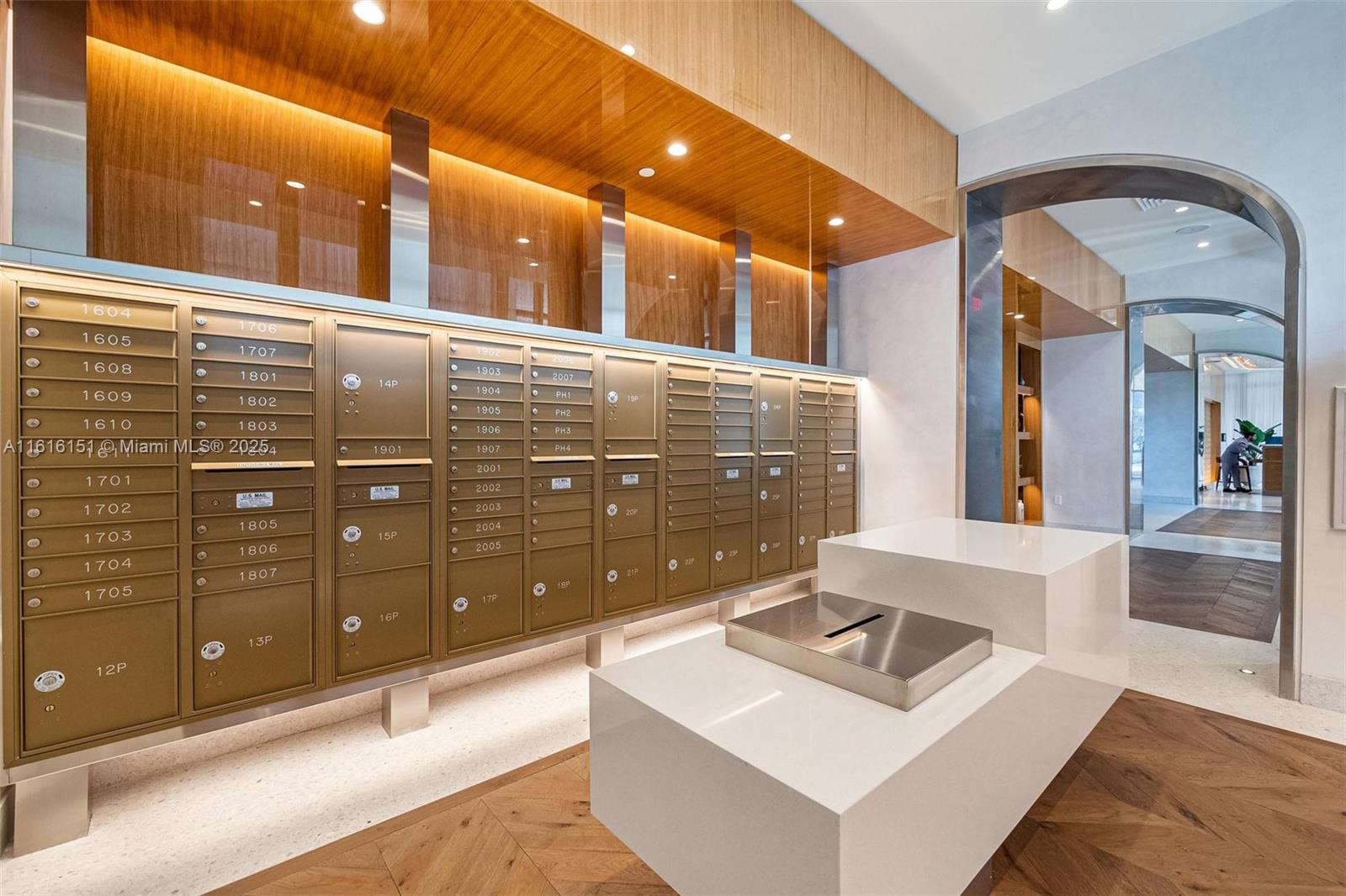 2678 Tigertail Avenue, Unit 1104 Miami, FL 33133 - Photo 62 of 65 a bathroom with a sink mirror and shower