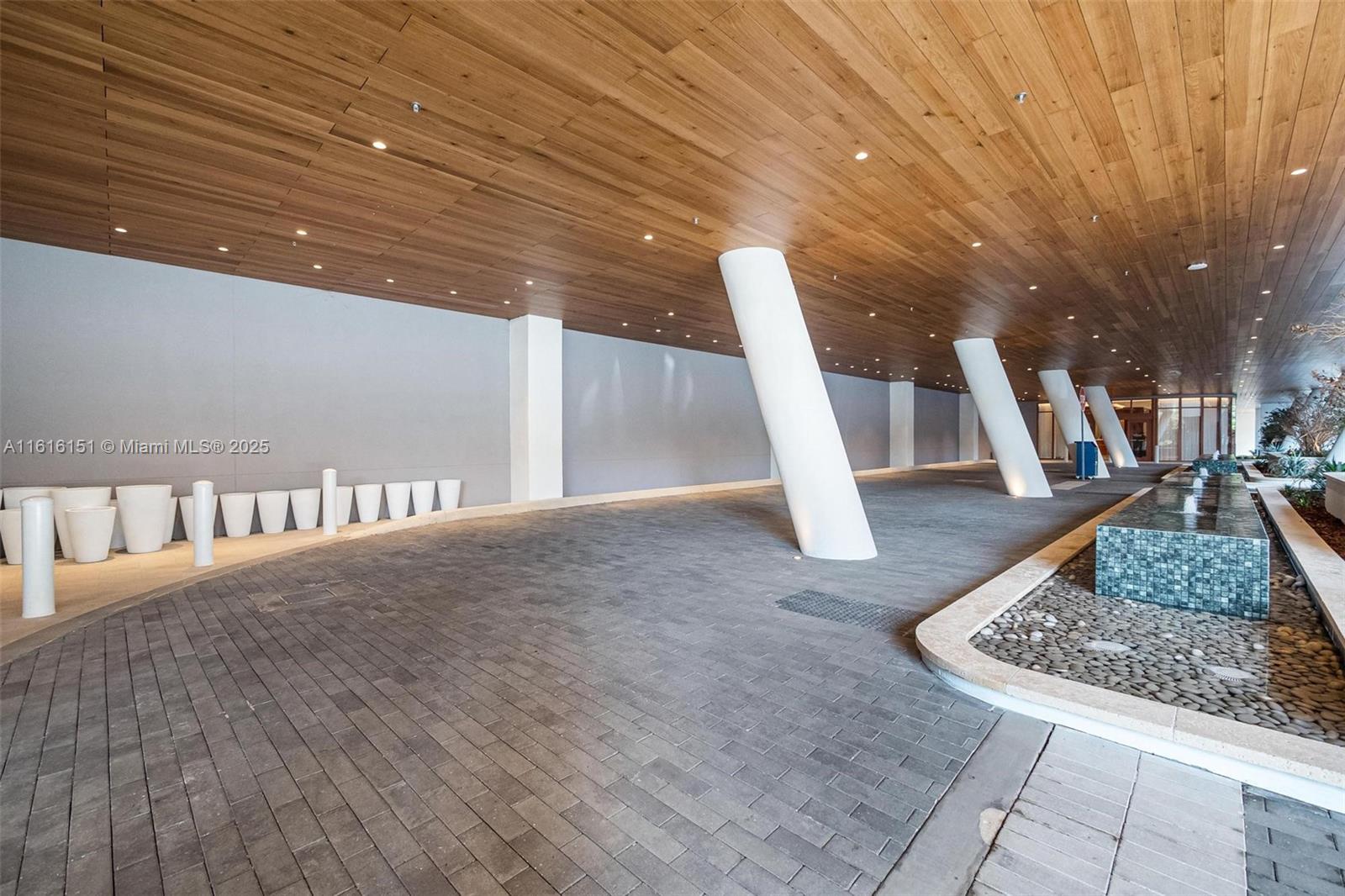 2678 Tigertail Avenue, Unit 1104 Miami, FL 33133 - Photo 64 of 65 a view of a hall