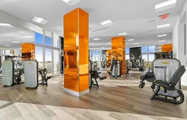 a view of a room with gym equipment