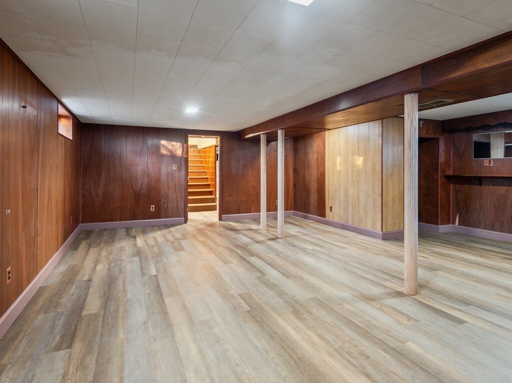 1 Foley Drive Framingham, MA 01701 - Photo 13 of 17 a view of an empty room with wooden floor and entryway