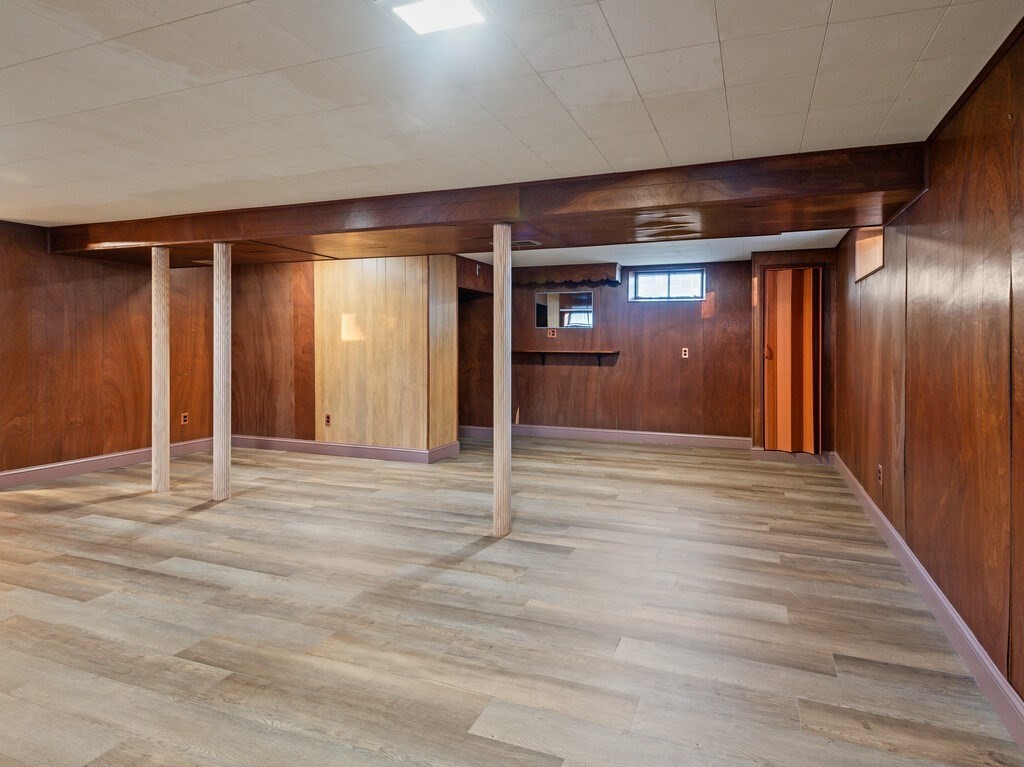 1 Foley Drive Framingham, MA 01701 - Photo 14 of 17 a view of an empty room with wooden floor