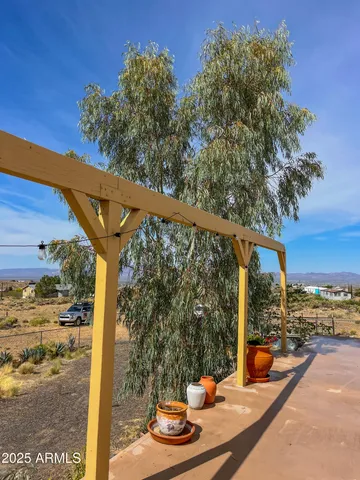 a view of a street with a building in the background