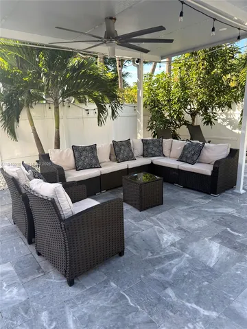 a view of a yard with an outdoor space