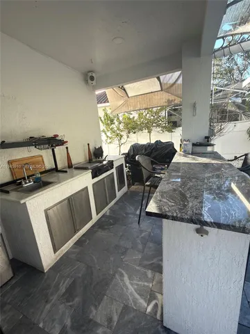 a view of outdoor space with seating area