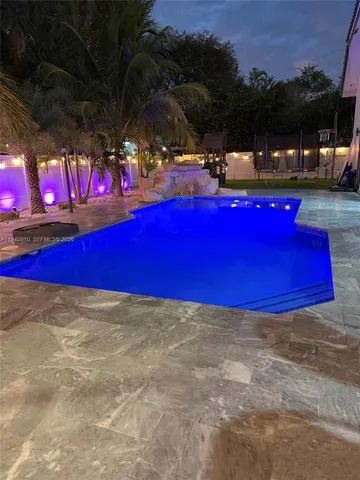 a front view of a building with many windows