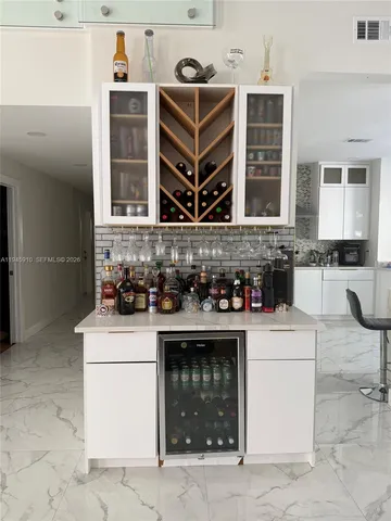 a kitchen with a stove and a microwave