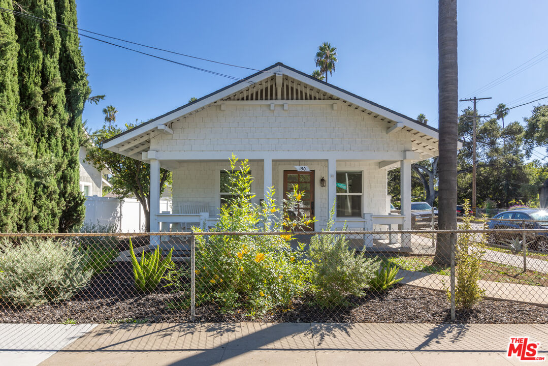 150 Dearborn Street Pasadena, CA 91103 - Photo 1 of 4 a front view of a house with garden