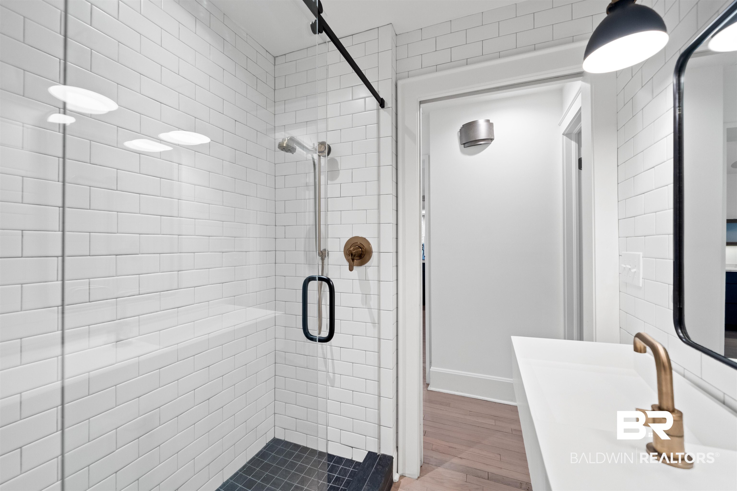 106 White Avenue Fairhope, AL 36532 - Photo 14 of 35 Full bath featuring a shower stall and wood finished floors