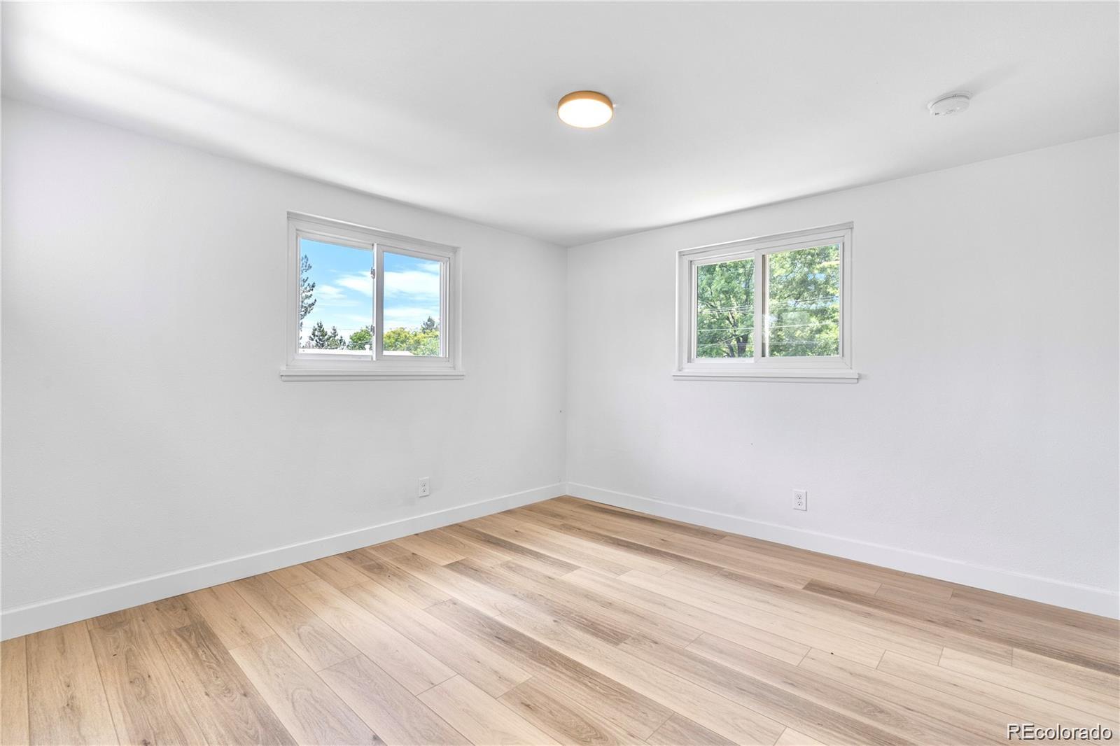 6500 West 32nd Avenue Wheat Ridge, CO 80033 - Photo 14 of 39 an empty room with windows