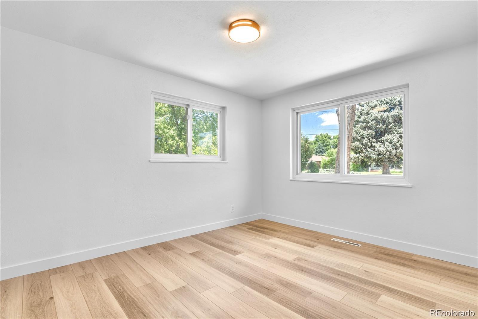 6500 West 32nd Avenue Wheat Ridge, CO 80033 - Photo 21 of 39 an empty room with a window