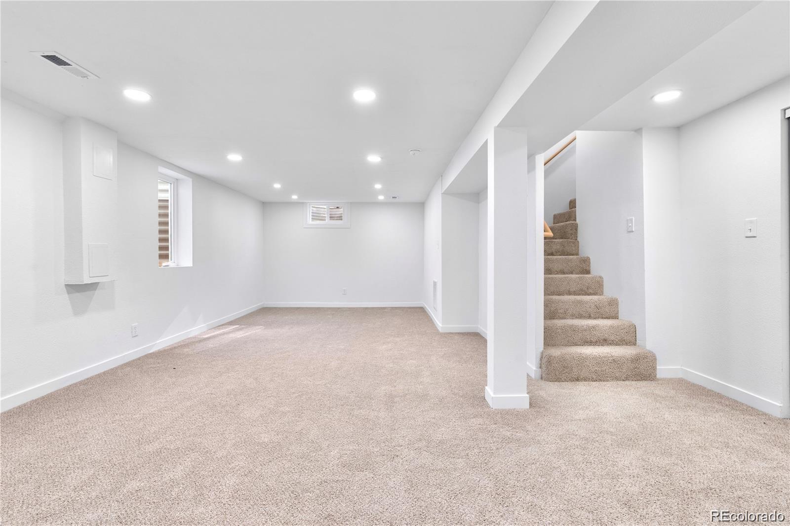 6500 West 32nd Avenue Wheat Ridge, CO 80033 - Photo 22 of 39 a view of an empty room with stairs