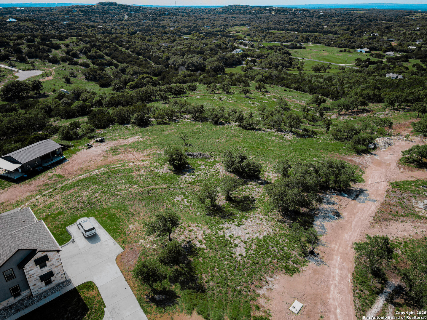 818 Lovett Rdg Road Bulverde, TX 78163 - Photo 12 of 12 an aerial view of a house with a yard