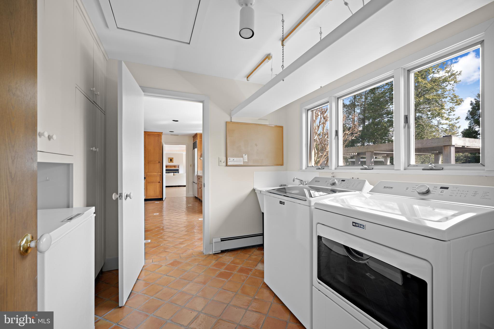 6 Ober Road Princeton, NJ 08540 - Photo 14 of 49 Laundry room with lighted plant shelf above.