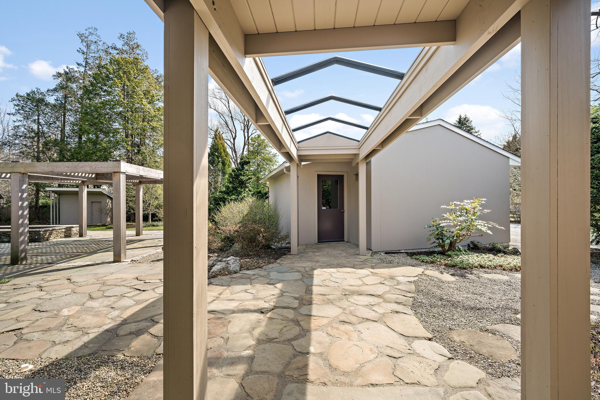 6 Ober Road Princeton, NJ 08540 - Photo 16 of 49 Covered glass walkway to 2-car garage.