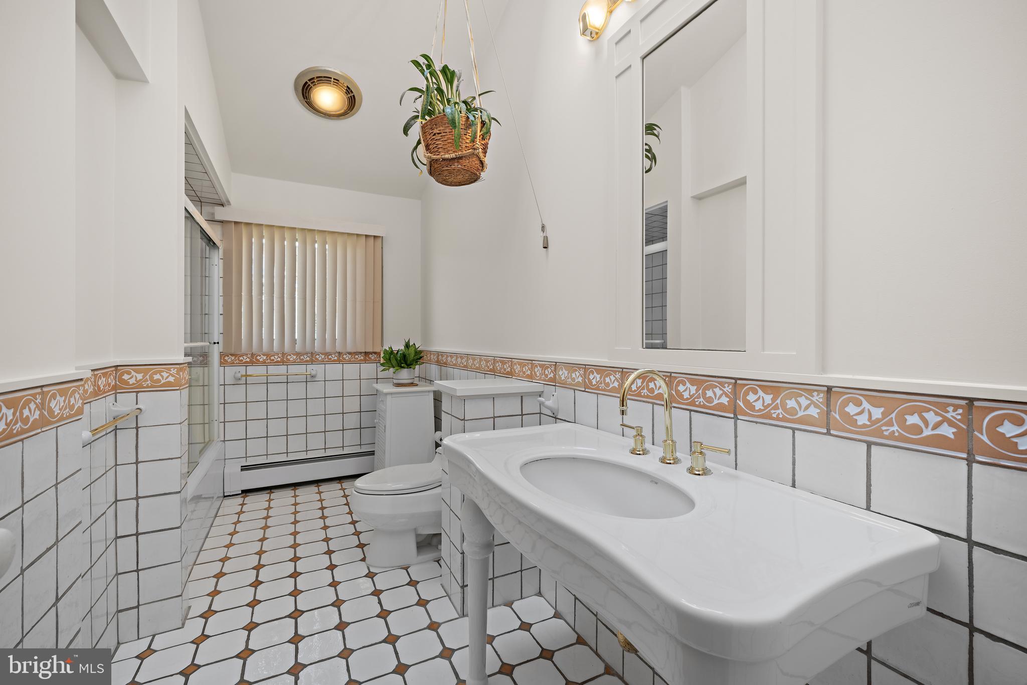 6 Ober Road Princeton, NJ 08540 - Photo 29 of 49 Full hall bathroom with vaulted ceiling.