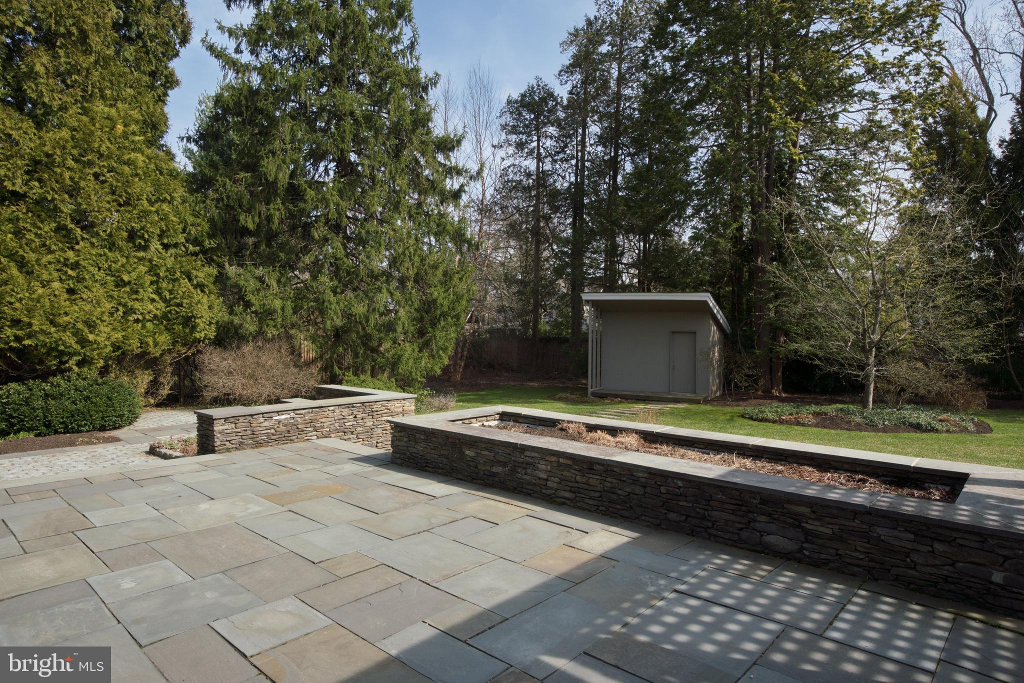 6 Ober Road Princeton, NJ 08540 - Photo 41 of 49 Blue stone patio with stone planter.
