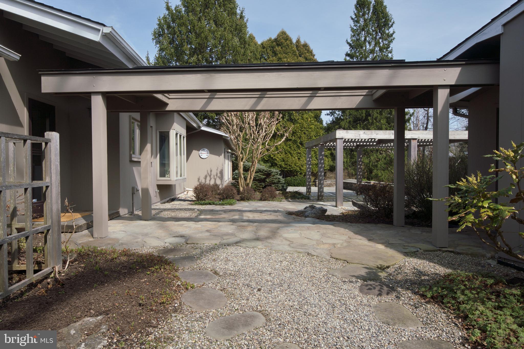 6 Ober Road Princeton, NJ 08540 - Photo 48 of 49 Glass covered walkway to two-car garage.