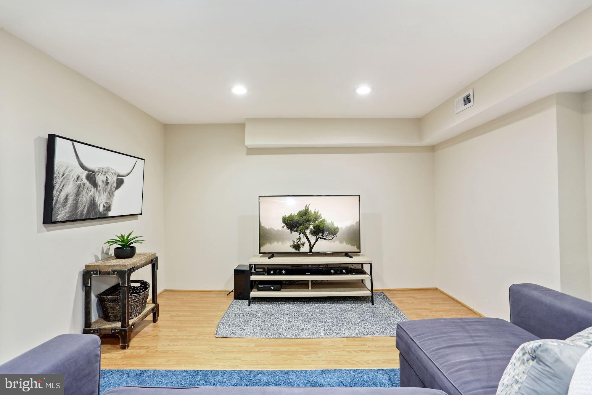 11953 Appling Valley Road Fairfax, VA 22030 - Photo 21 of 35 Basement TV /Lounge
