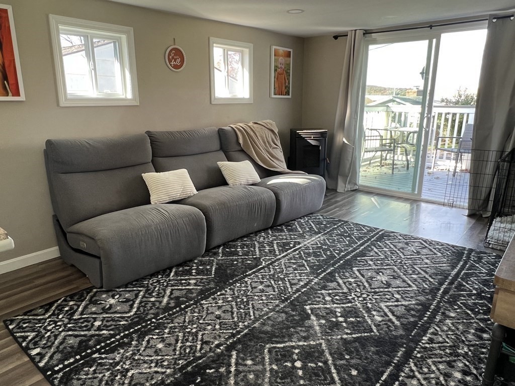 12 Sichols Colony Road Wales, MA 01081 - Photo 7 of 19 a living room with furniture and a rug