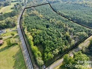 a view of a yard from a balcony