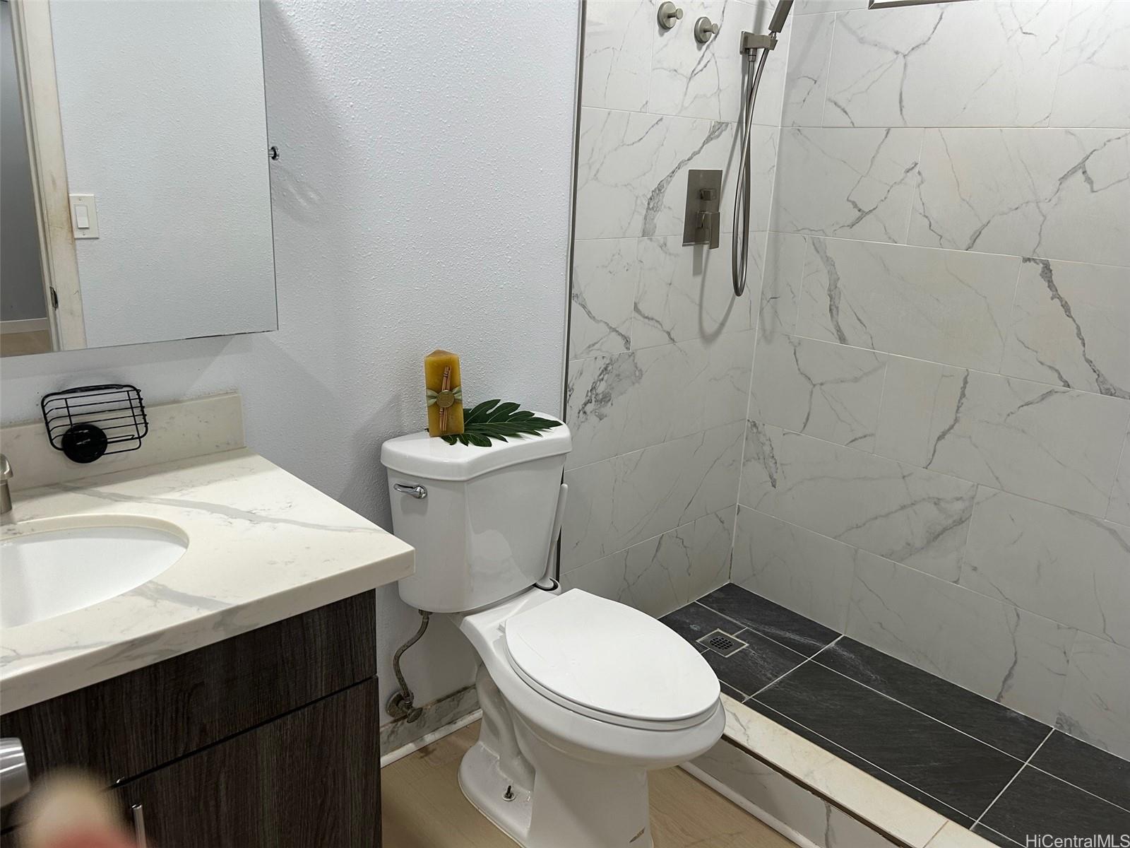 84-116 Kapakai Place Waianae, HI 96792 - Photo 9 of 14 a bathroom with a sink and toilet