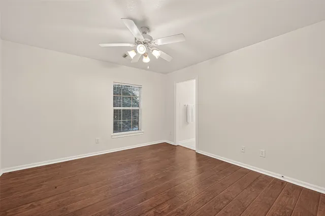 a bathroom with a sink vanity and a mirror
