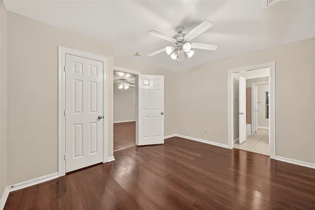 a view of house with backyard and porch