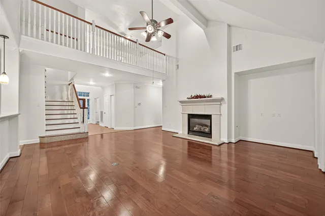 a view of an entryway with wooden floor