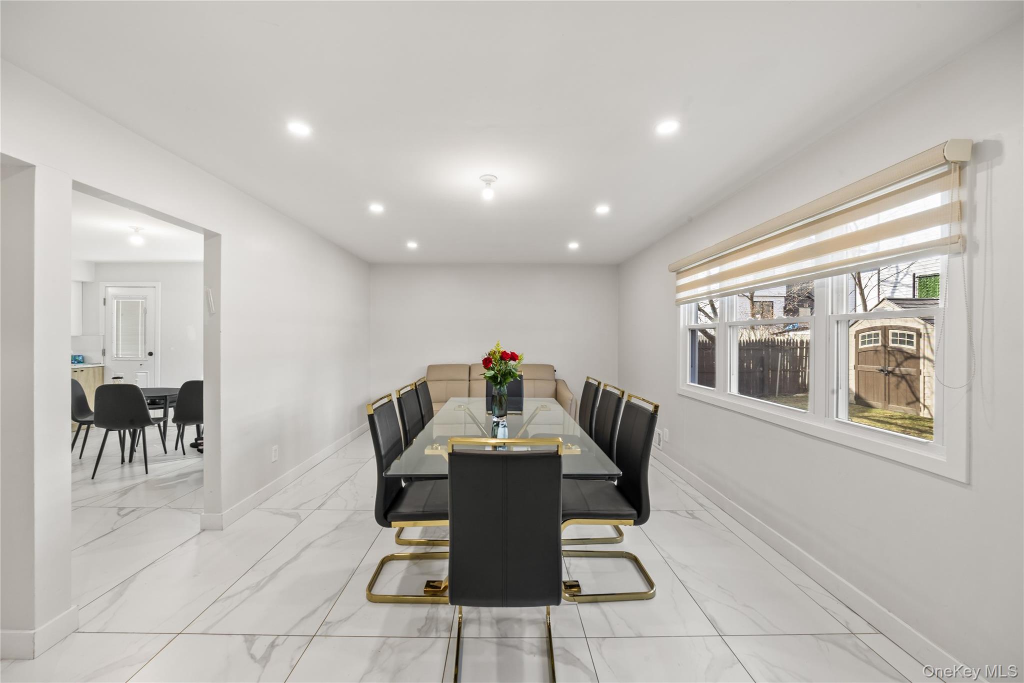 10 Sneden Court Spring Valley, NY 10977 - Photo 11 of 42 a view of a dining room with furniture and chandelier