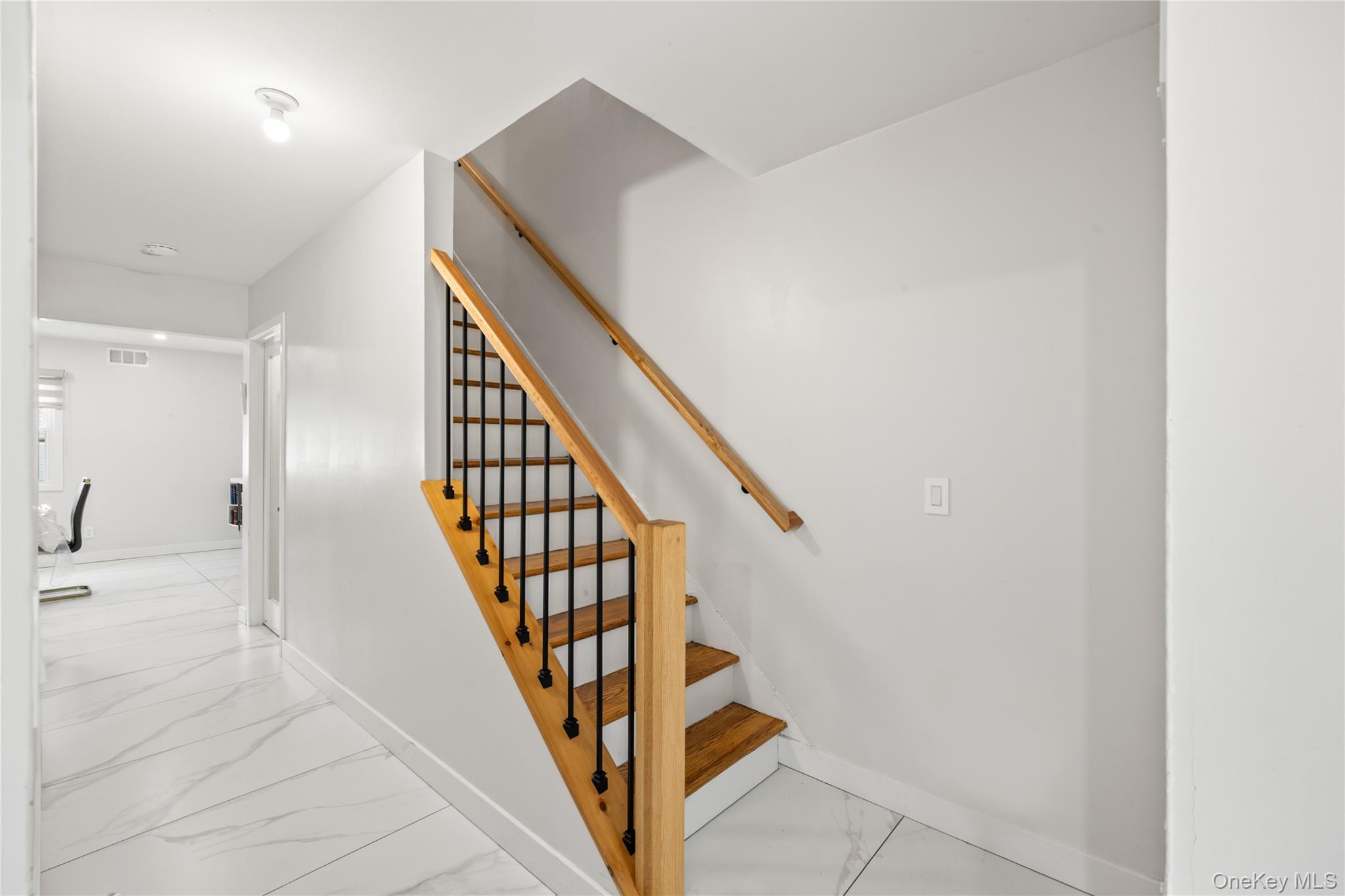 10 Sneden Court Spring Valley, NY 10977 - Photo 22 of 42 a view of a hallway with staircase