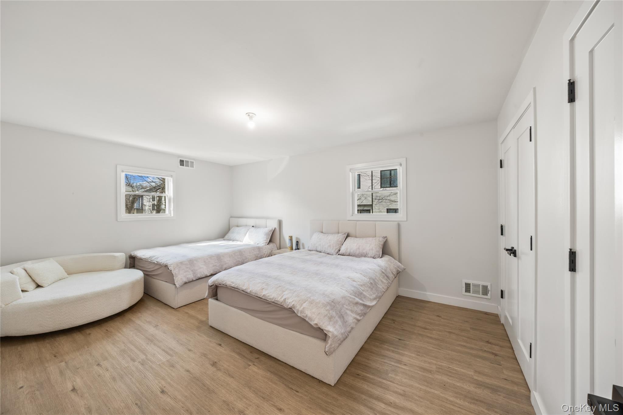 10 Sneden Court Spring Valley, NY 10977 - Photo 25 of 42 a bedroom with two beds and a couch