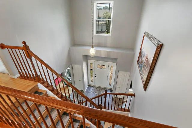 a view of an entryway with a workspace