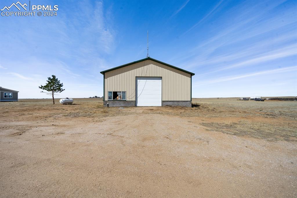 8160 Edison Road Yoder, CO 80864 - Photo 42 of 42 a view of a house with a yard