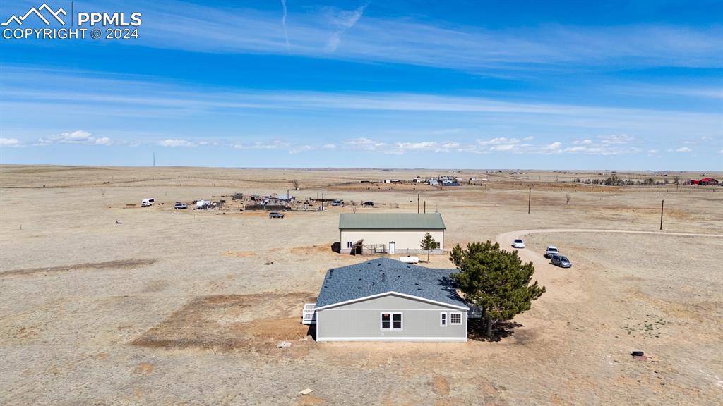 8160 Edison Road Yoder, CO 80864 - Photo 6 of 42 an aerial view of a house with a outdoor space