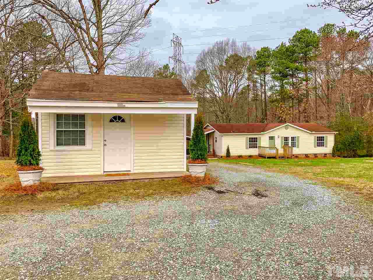 6603 Russell Road Durham, NC 27712 - Photo 17 of 30 618sqft detached office w/ road frontage ideal for any entrepreneur/small business owner. 434sqft shed w/ electricity great for addt'l. storage or workshop.