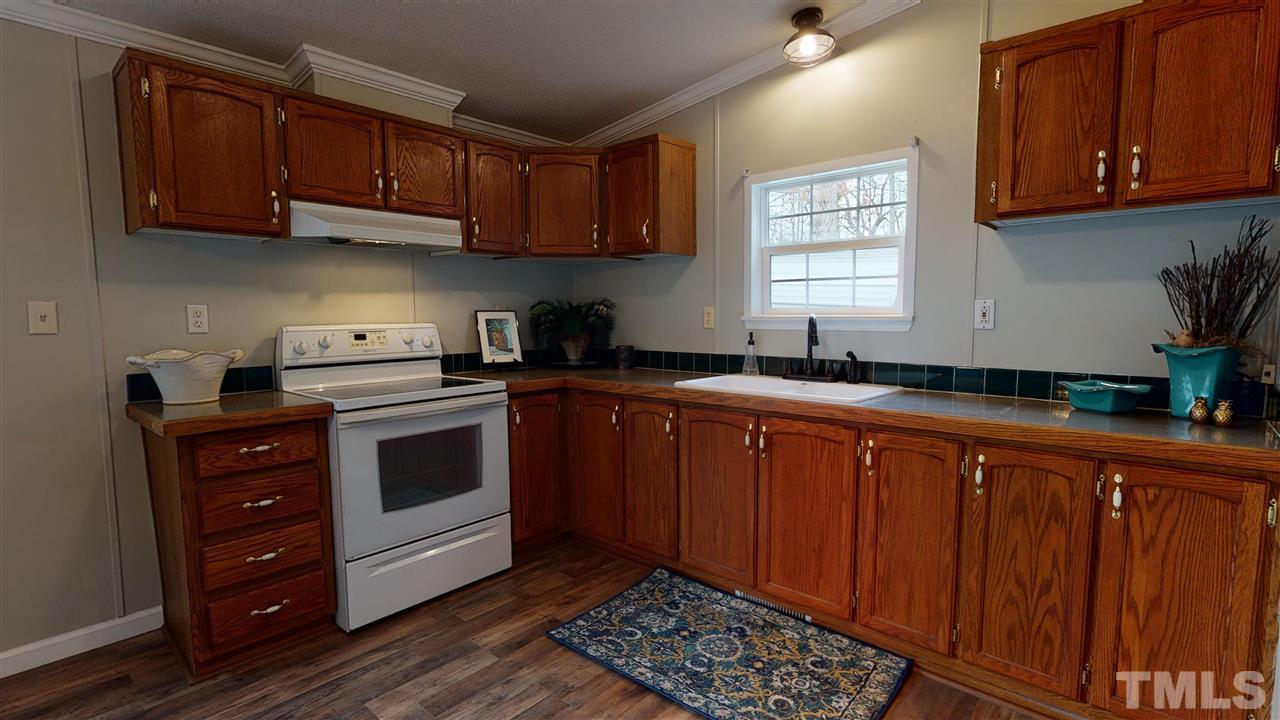 6603 Russell Road Durham, NC 27712 - Photo 3 of 30 Fresh Paint, Luxury Vinyl Flooring, & Upgraded Fixtures throughout.