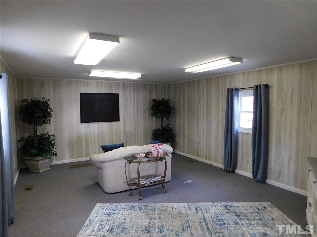6603 Russell Road Durham, NC 27712 - Photo 20 of 30 618sqft detached flex space (heated/cooled) ideal for office & small business owner or added recreation space/game room!