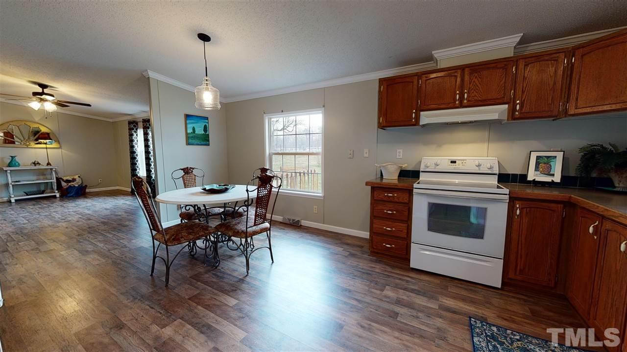 6603 Russell Road Durham, NC 27712 - Photo 4 of 30 Fresh Paint, Luxury Vinyl Flooring, & Upgraded Fixtures throughout.