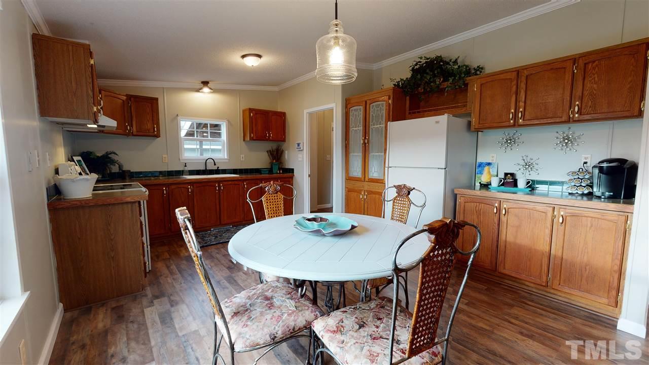 6603 Russell Road Durham, NC 27712 - Photo 5 of 30 Fresh Paint, Luxury Vinyl Flooring, & Upgraded Fixtures throughout.