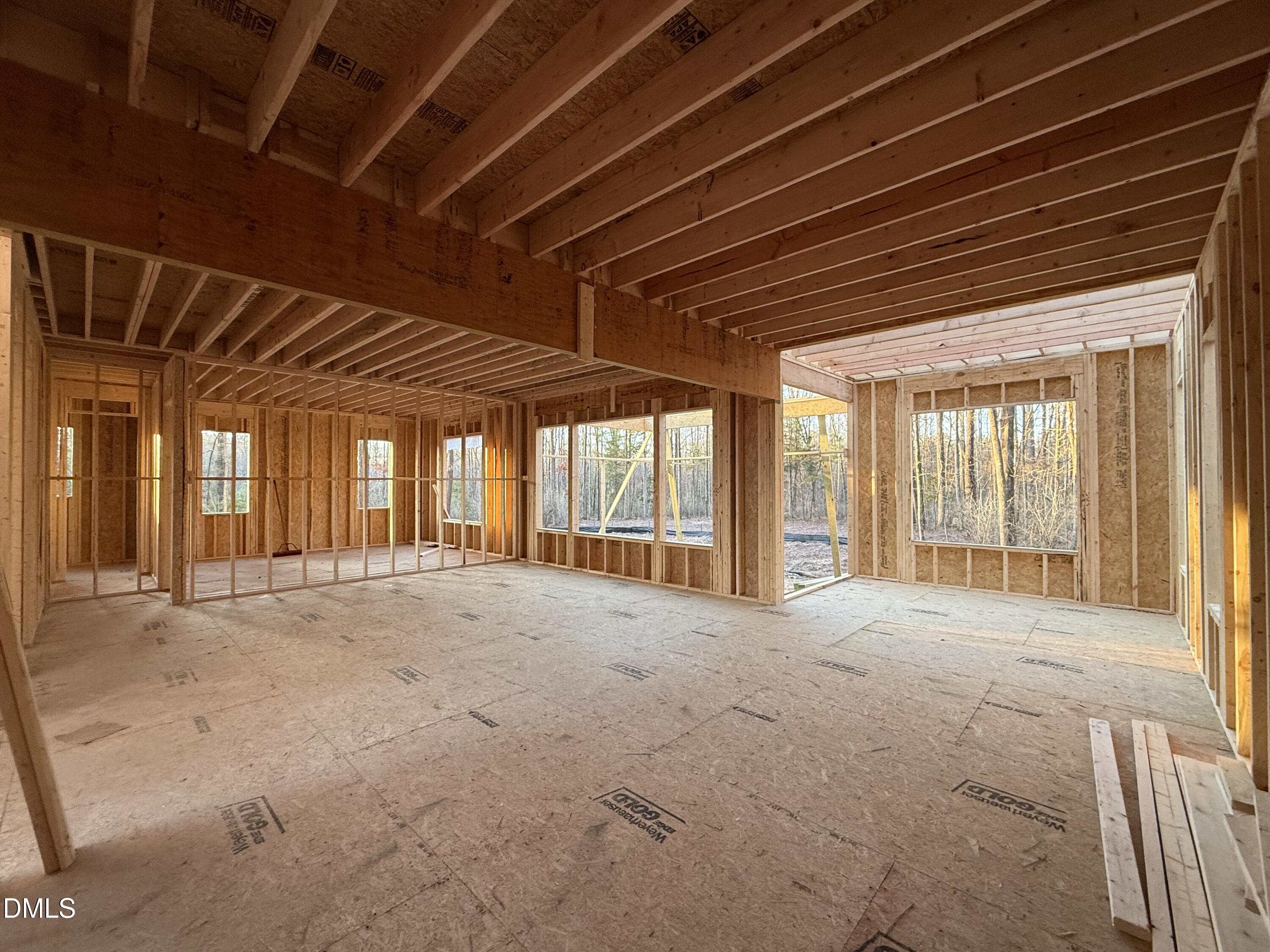 a view of an empty room with windows