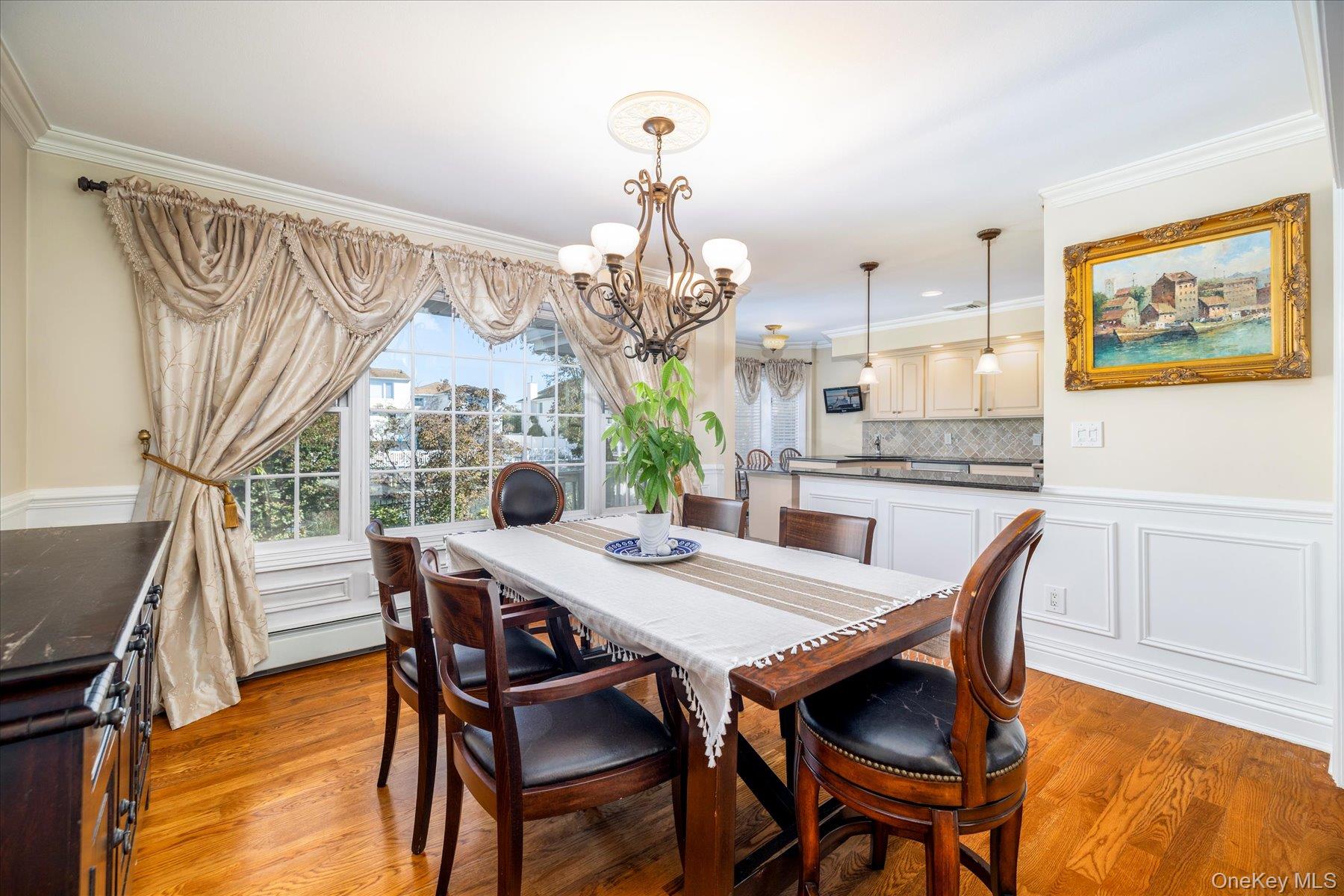 2863 Harbor Road Merrick, NY 11566 - Photo 11 of 35 a view of a dining room with furniture window and wooden floor