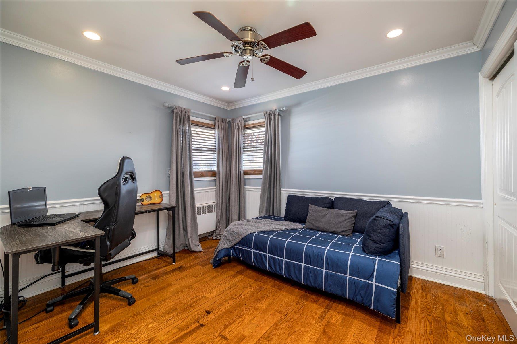 2863 Harbor Road Merrick, NY 11566 - Photo 15 of 35 a bedroom with furniture and a window