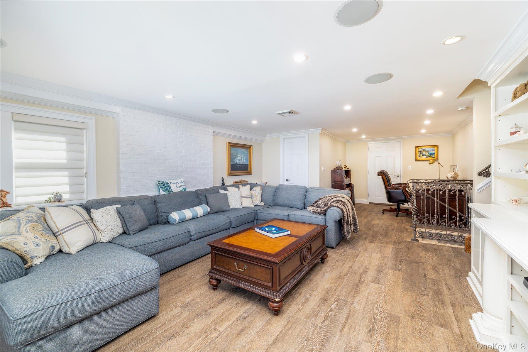 2863 Harbor Road Merrick, NY 11566 - Photo 20 of 35 a living room with furniture kitchen view and a window